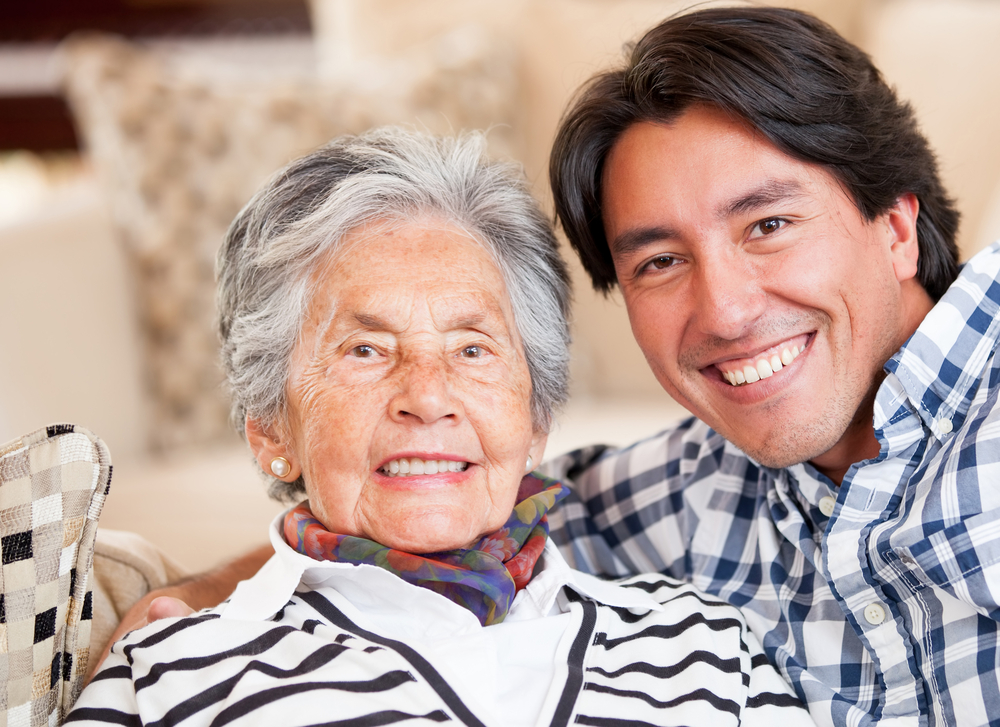 Happy portrait of a grandmother and her grandson smiling